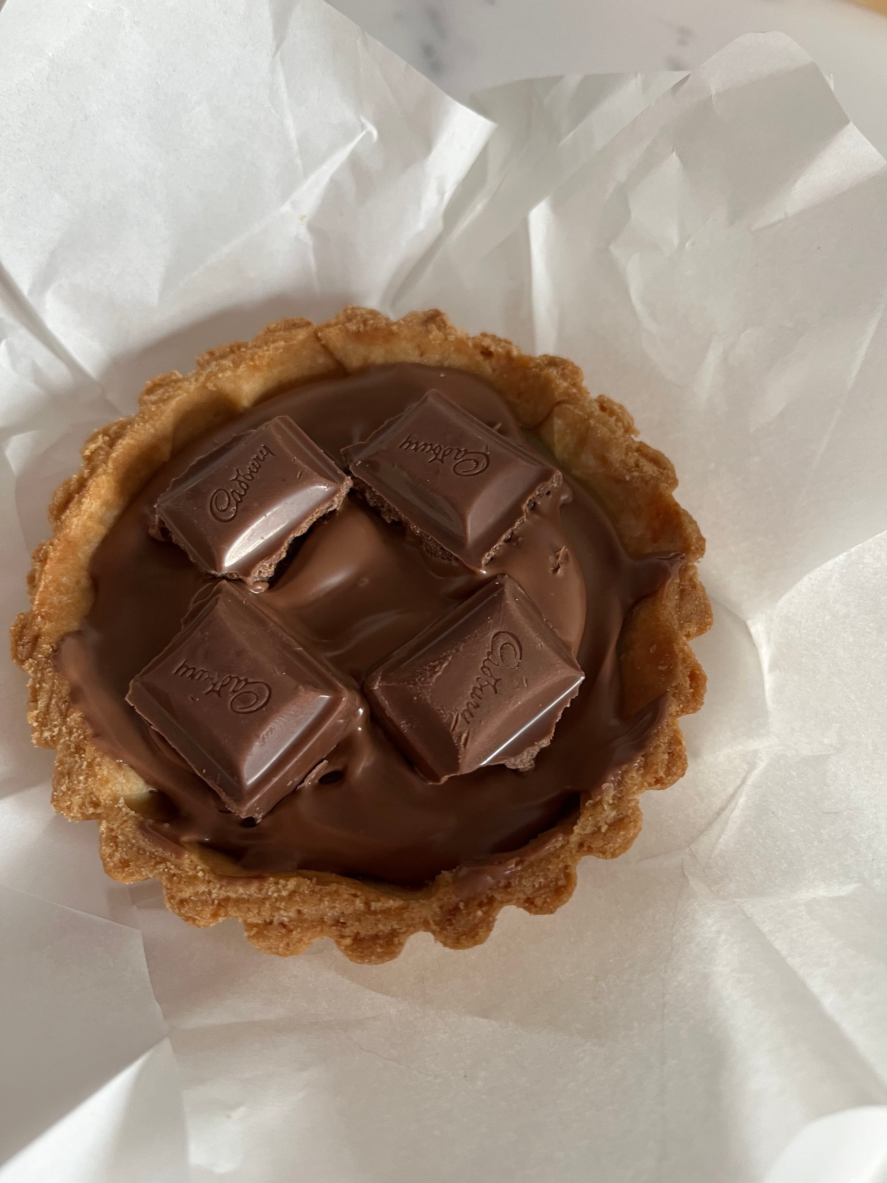 Pure Bliss: Chocolate, Caramel, and Bueno Heaven ( price for 1)Tart measurements diameter 3" Height 1""We happily cater to all dietary needs—just ask!"